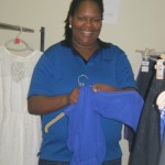 Lungiswa hanging up clothes